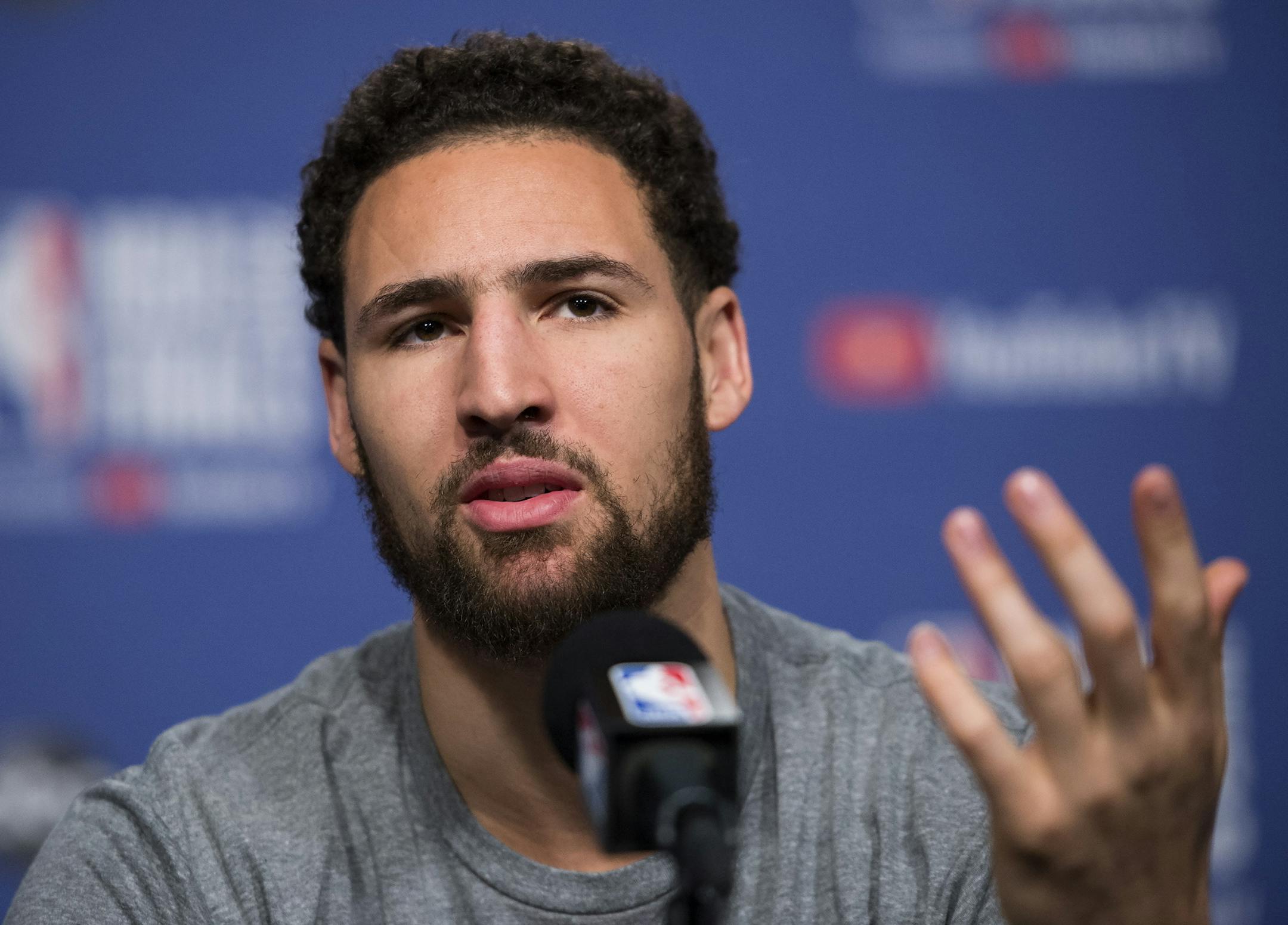 FILE - In this May 29, 2019 file photo Golden State Warriors basketball guard Klay Thompson speaks to the media before practice for the NBA Finals against the Toronto Raptors in Toronto. Thompson announced Monday, July 1, 2019 his decision to stay with the Golden State Warriors for $190 million over the next five years, meaning the five-time reigning Western Conference champions have their 'Splash Brothers' backcourt of Thompson and Stephen Curry locked up long-term. (Nathan Denette/The Canadian