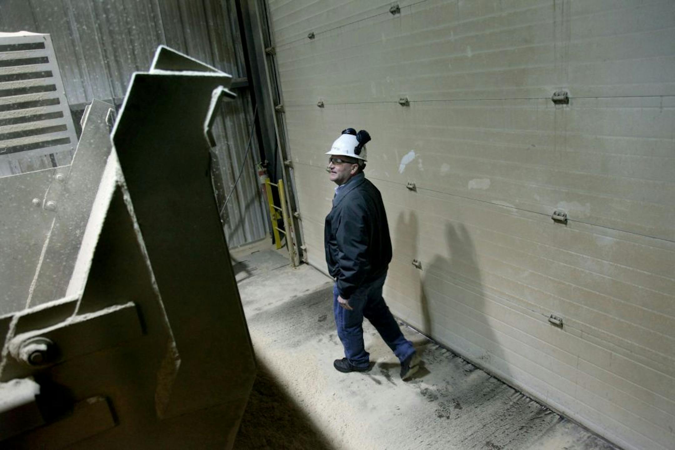 Stacy Cook, the Vice President of Operations at Koda Energy LLC, monitored a delivery from a truck carrying biomass, Tuesday, January 24, 2012 in Shakopee, MN. Biomass is wood or agricultural residues.