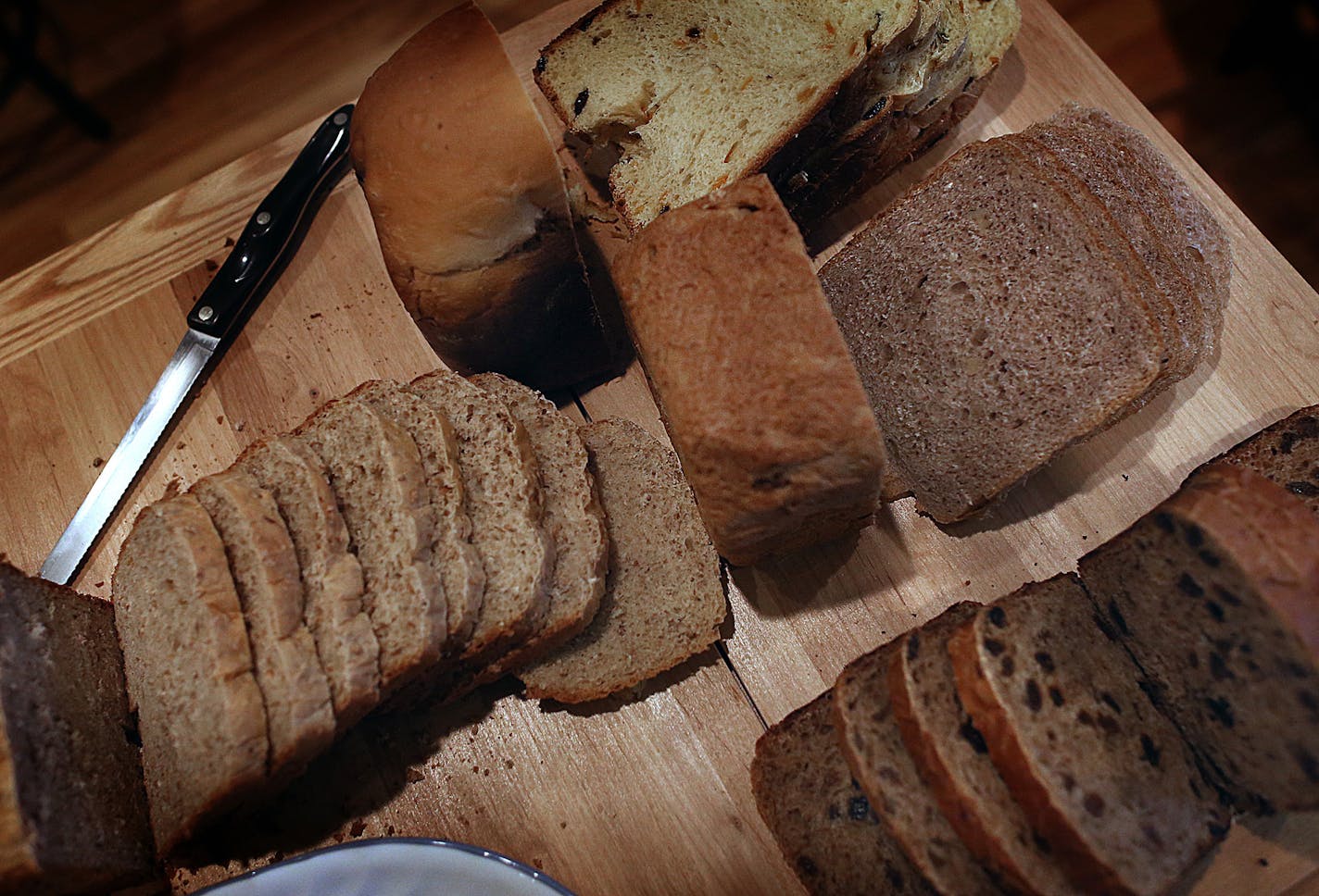 The bread was cut into slices and ready for toasting. ] Photo by Jim Gehrz / JIM GEHRZ&#x2022;jgehrz@startribune.com (JIM GEHRZ/STAR TRIBUNE) / February 9, 2013 / 11:00 AM Minneapolis, MN** BACKGROUND INFORMATION: A group of Minneapolis friends have been running together each Saturday morning for 20 years. After each run, the group ends up at one of their homes, where they enjoy eating two loaves of bread bakes by the host. They use bread machines and have explored many recipes over the years. R