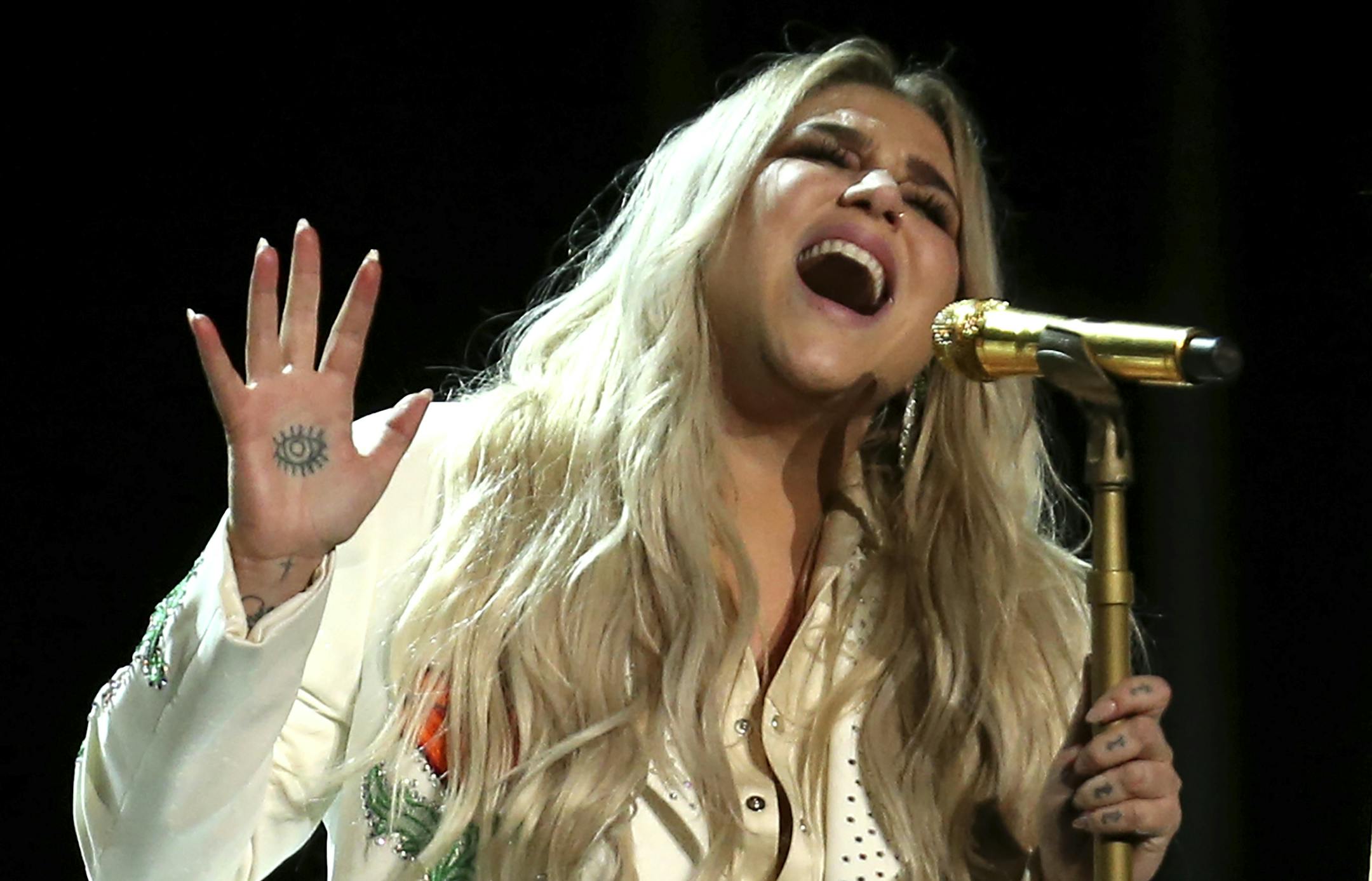 Kesha performs "Praying" at the 60th annual Grammy Awards at Madison Square Garden on Sunday, Jan. 28, 2018, in New York. (Photo by Matt Sayles/Invision/AP)