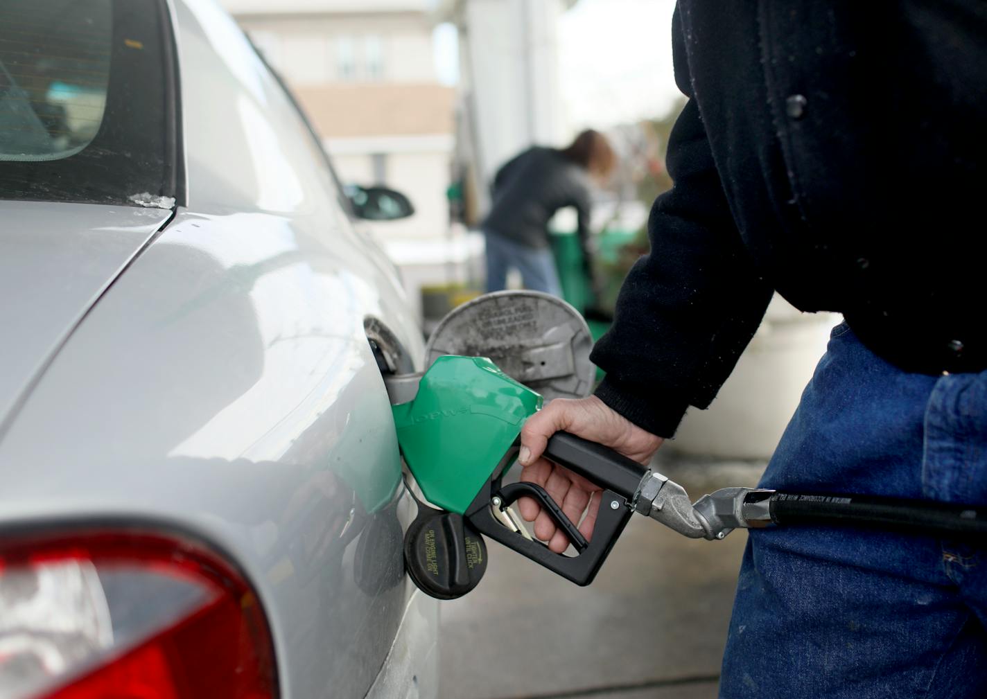 Motorist Edward Foss of North Minneapolis pumps $1.99 gas at 36 Lyn Refuel Station at 36th and S. Lyndale Avenue Thursday, January 3, 2019 in Minneapolis, MN. Foss says with lower gas prices he's been able to afford to travel further from home and do some small trips and more exploring.]