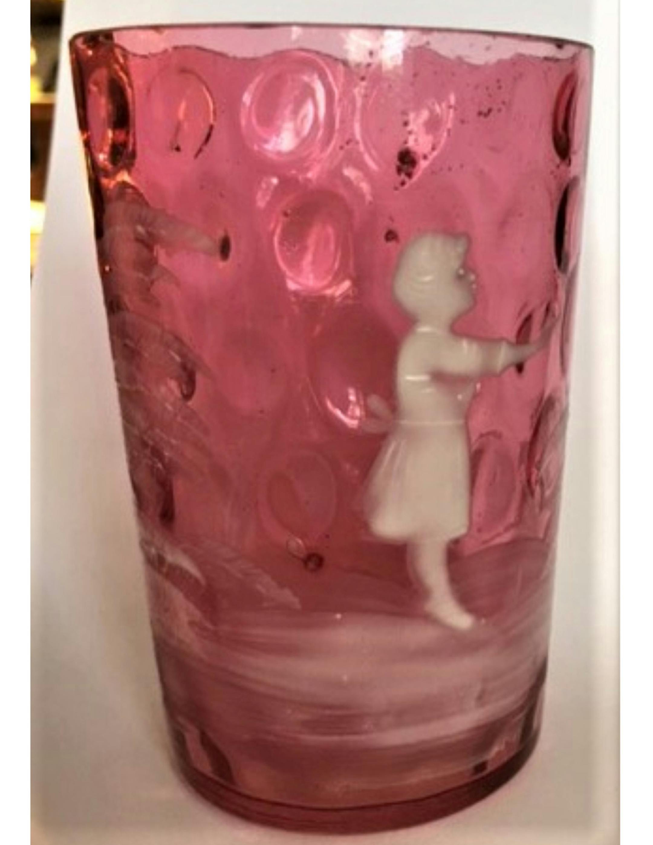 This is called a "Mary Gregory" tumbler. Why? (Handout/TNS) ORG XMIT: 1213375