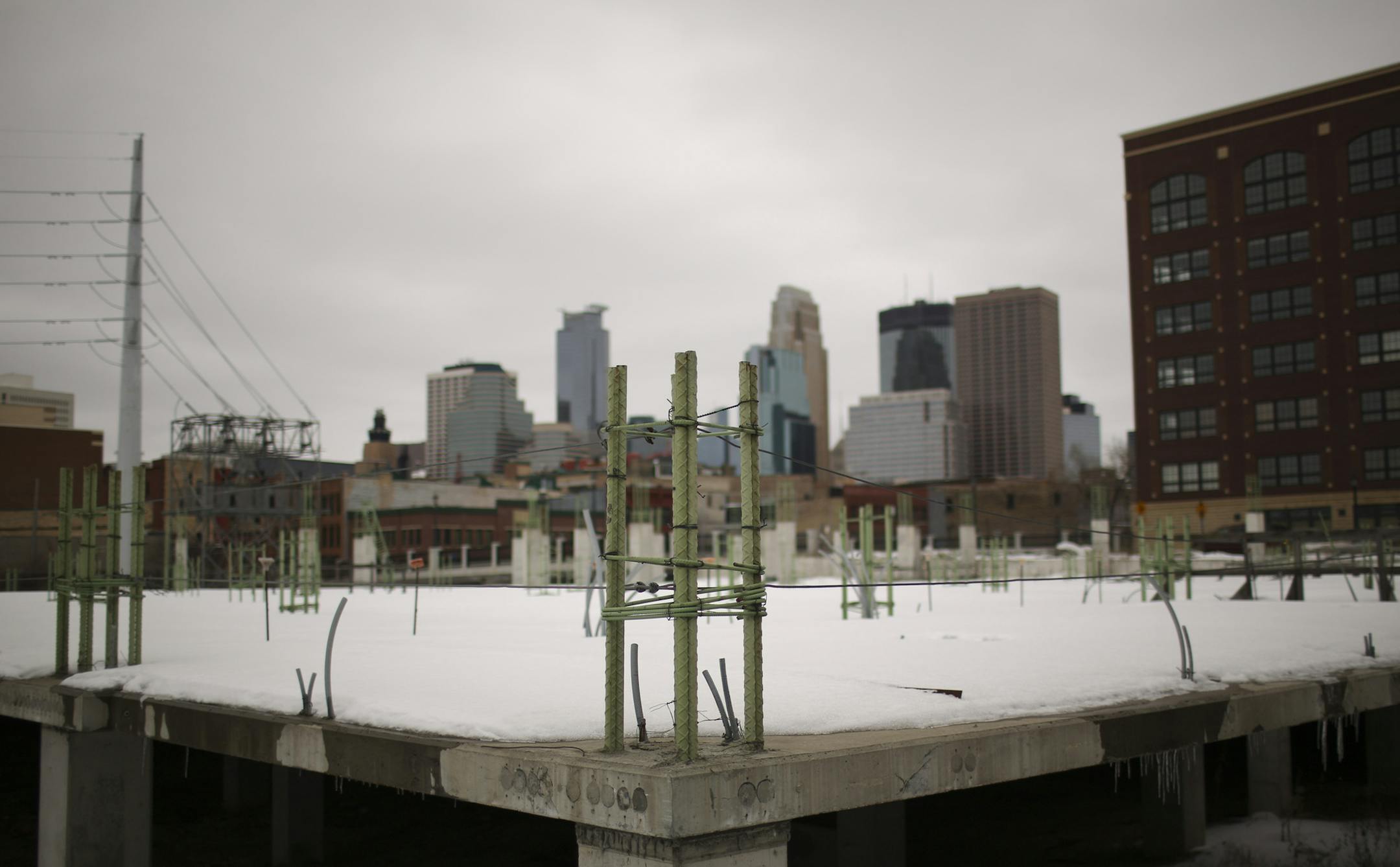 Sherman Associates has proposed a five-story apartment building with 140 units and two levels of underground parking at the site of a former condo project.