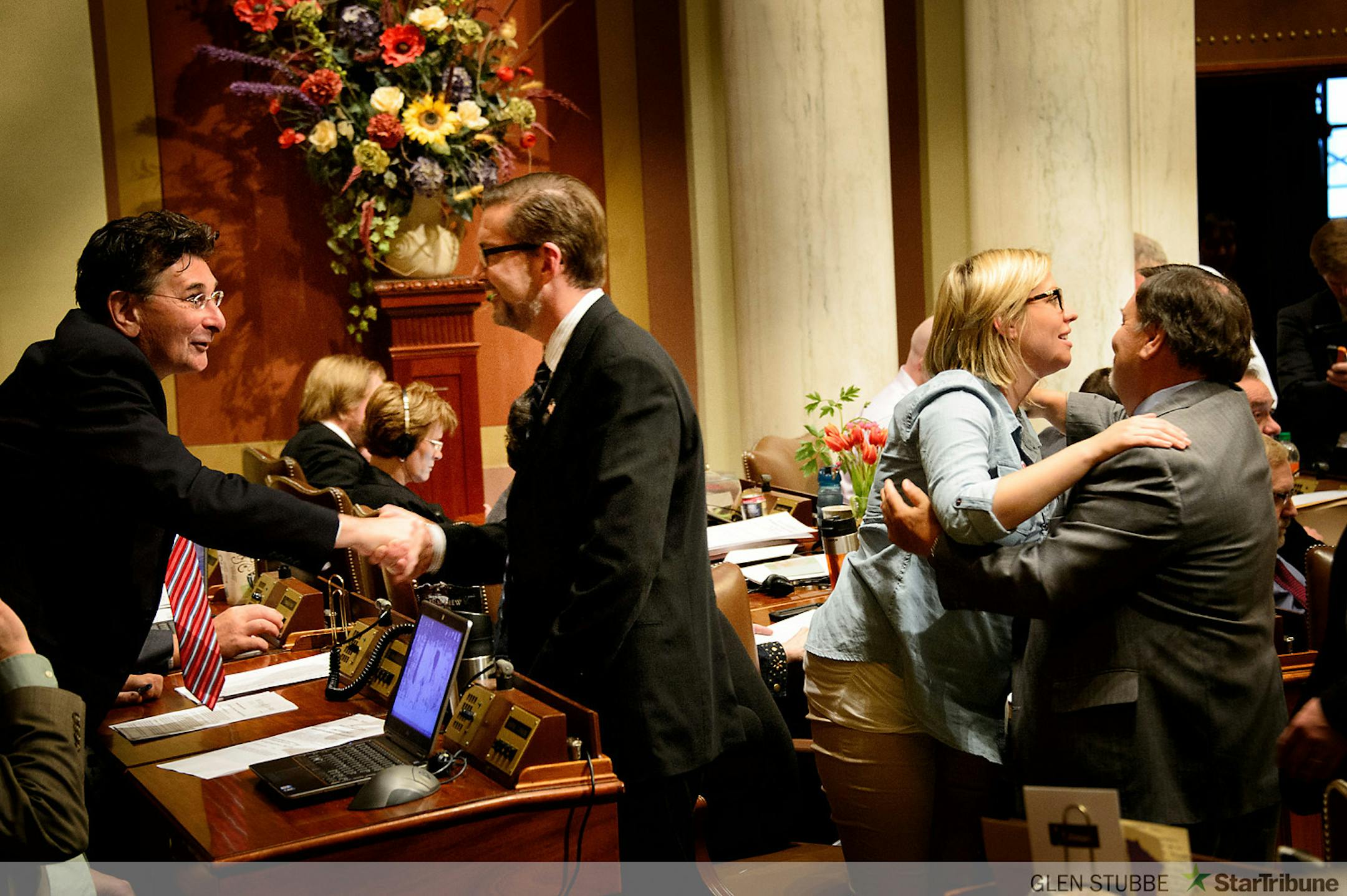 Medical Marijuana bill authors Sen. Scott Dibble and Rep.  Rep. Carly Melin were congratulated after the medical marijuana bill passed the House.       ]     Friday, May 16, 2014   GLEN STUBBE * gstubbe@startribune.com