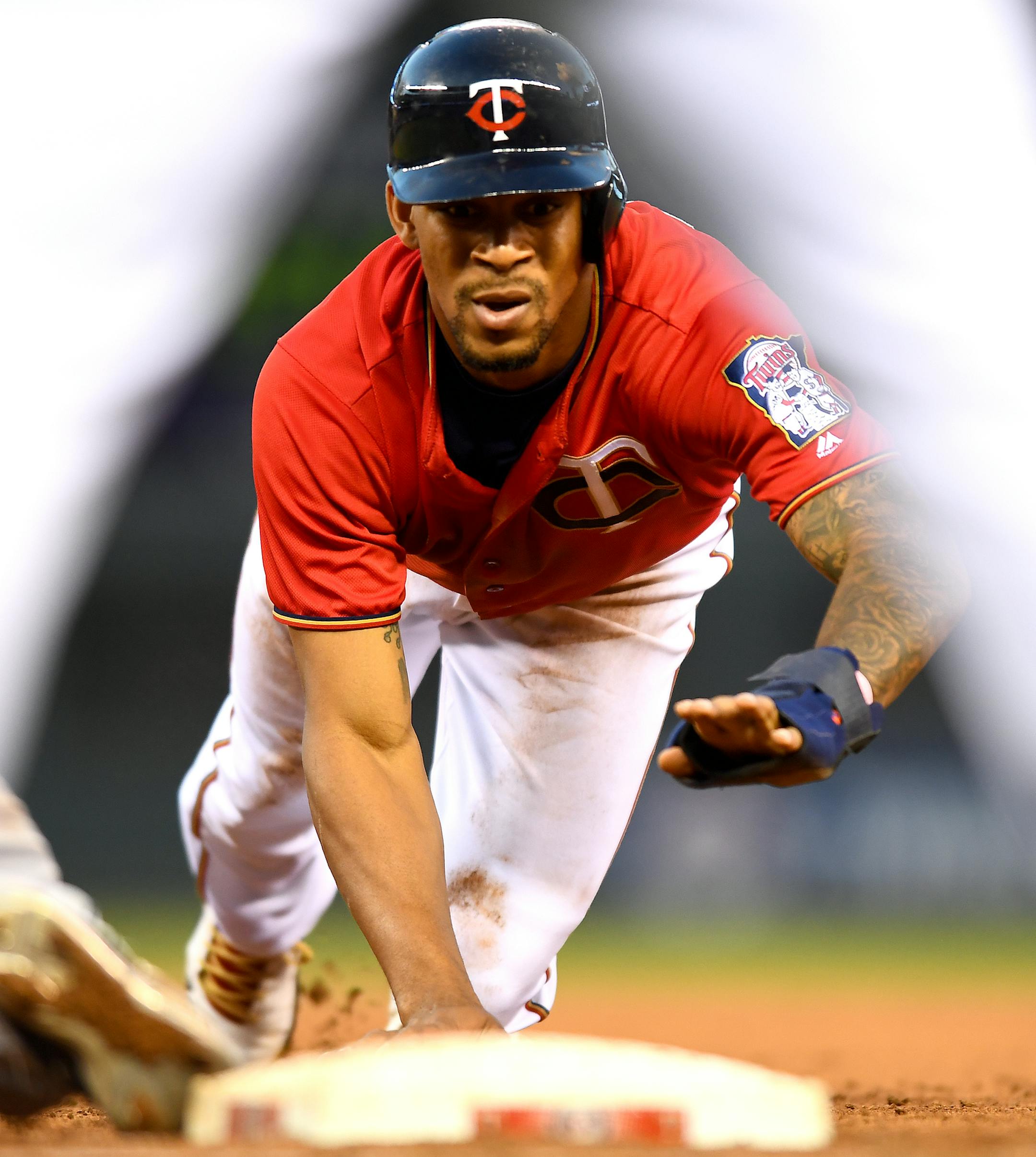 Minnesota Twins center fielder Byron Buxton (25) tagged back to first in the bottom of the 5th inning. ] (AARON LAVINSKY/STAR TRIBUNE) aaron.lavinsky@startribune.com The Minnesota Twins played the Cleveland Indians on Friday, July 15, 2016 at Target Field in Minneapolis, Minn. ORG XMIT: MIN1607152223491653