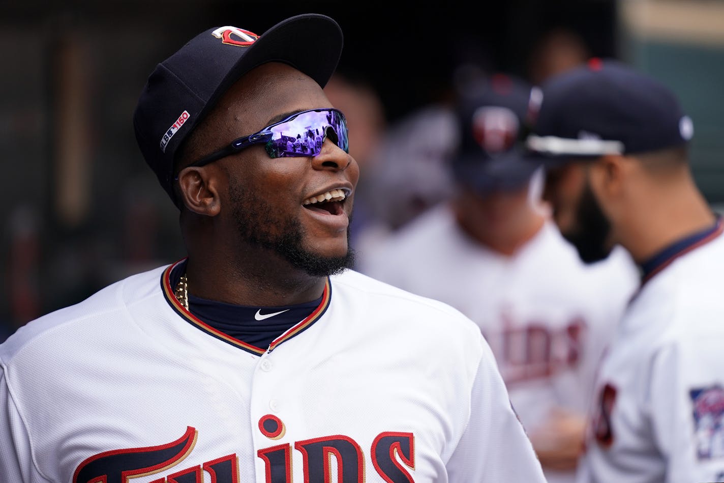 Injured Twins third baseman Miguel Sano smiled from the dugout on Opening Day. He is set to report to Fort Myers this week to enhance his rehab from a cut heel.