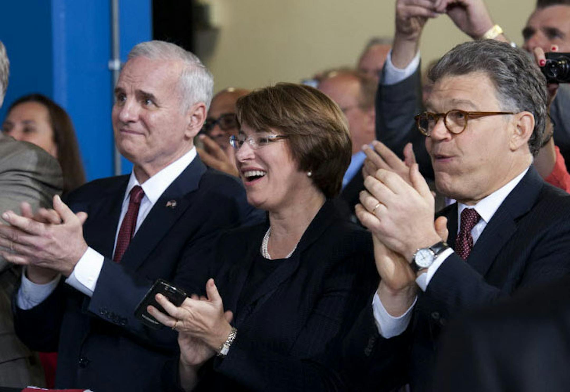 Gov. Mark Dayton, with Sens. Amy Klobuchar and Al Franken