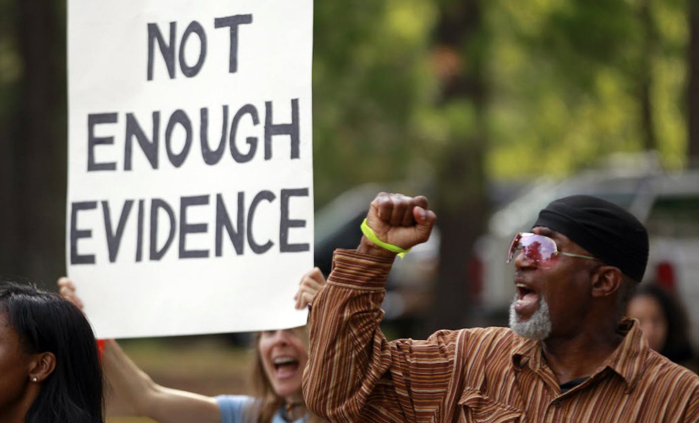 A man chants during a vigil for a Georgia death row inmate.