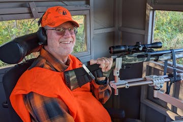 Evan Newton, driven to a wheelchair by a nerve disease, sat in a Wildlife Management Area blind in western Minnesota.