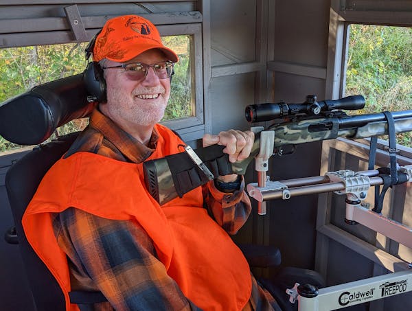 Evan Newton, driven to a wheelchair by a nerve disease, sat in a Wildlife Management Area blind in western Minnesota.
