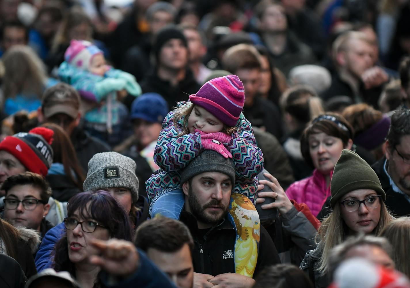 A young fan rested on an adult's shoulders before the start of Friday night's free concert on Nicollet Mall. ] AARON LAVINSKY &#xef; aaron.lavinsky@startribune.com Broadway star Idina Menzel, the voice of Frozen's "Let It Go," kicked off the Super Bowl Live free concerts series on Nicollet Mall Friday, Jan. 26, 2018 in Minneapolis, Minn.