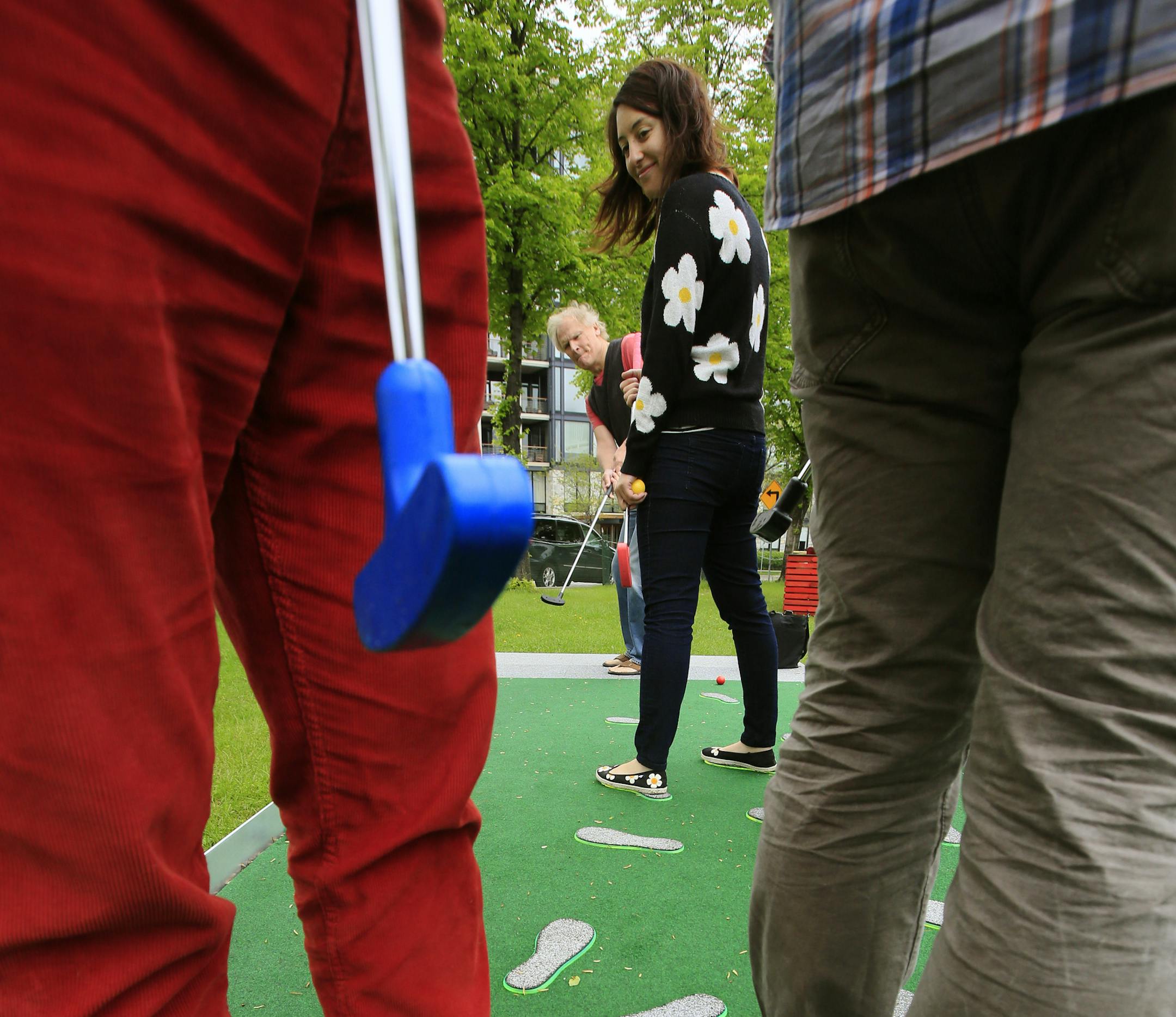 Walker Art Center's opening of a new Artist-designed-mini-golf course to mark the 25th anniversary of the Mpls sculpture garden will open Thursday, May 23rd. Here, Hole #7 course B, is designed to use your golf partners as obsticals. (Check with Mary Abby for artist name.) ] BRIAN PETERSON &#x201a;&#xc4;&#xa2; brianp@startribune.com Minneapolis, MN - 05/17/2013