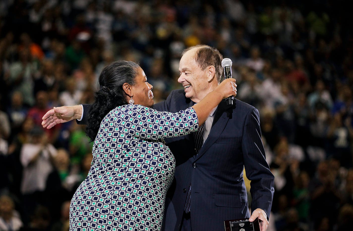 WNBA President Laurel Richie, shown with Lynx owner Glen Taylor during Sunday's championship ring ceremony, leads league that on Wednesday announced a marketing strategy to attract the LGBT community. "The WNBA welcomes all fans, athletes and partners to our game," Richie said in a news release.