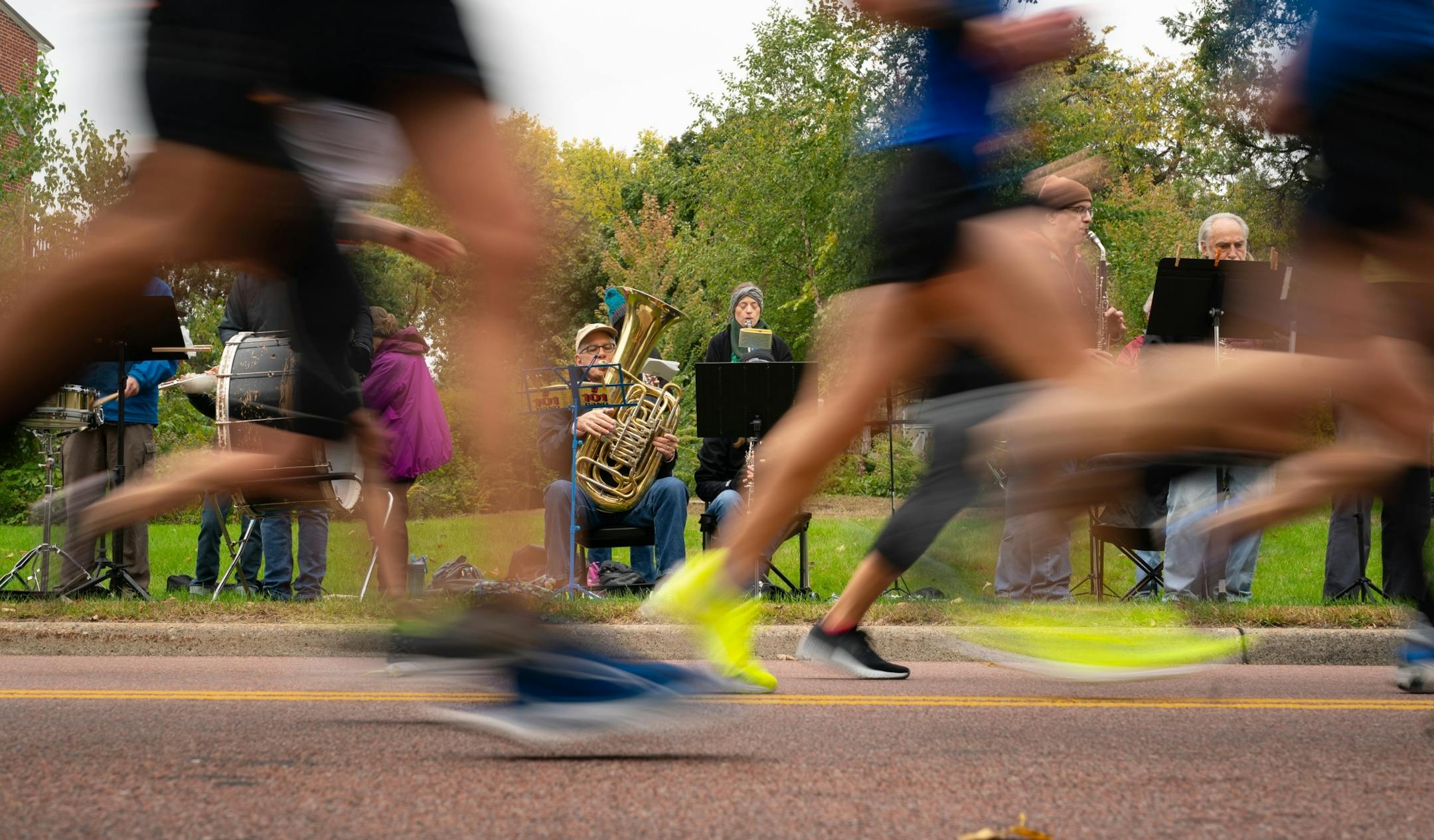 The Seward Concert Band played along West River Parkway between 17 and 18 mile marker during the Twin Cities Marathon.