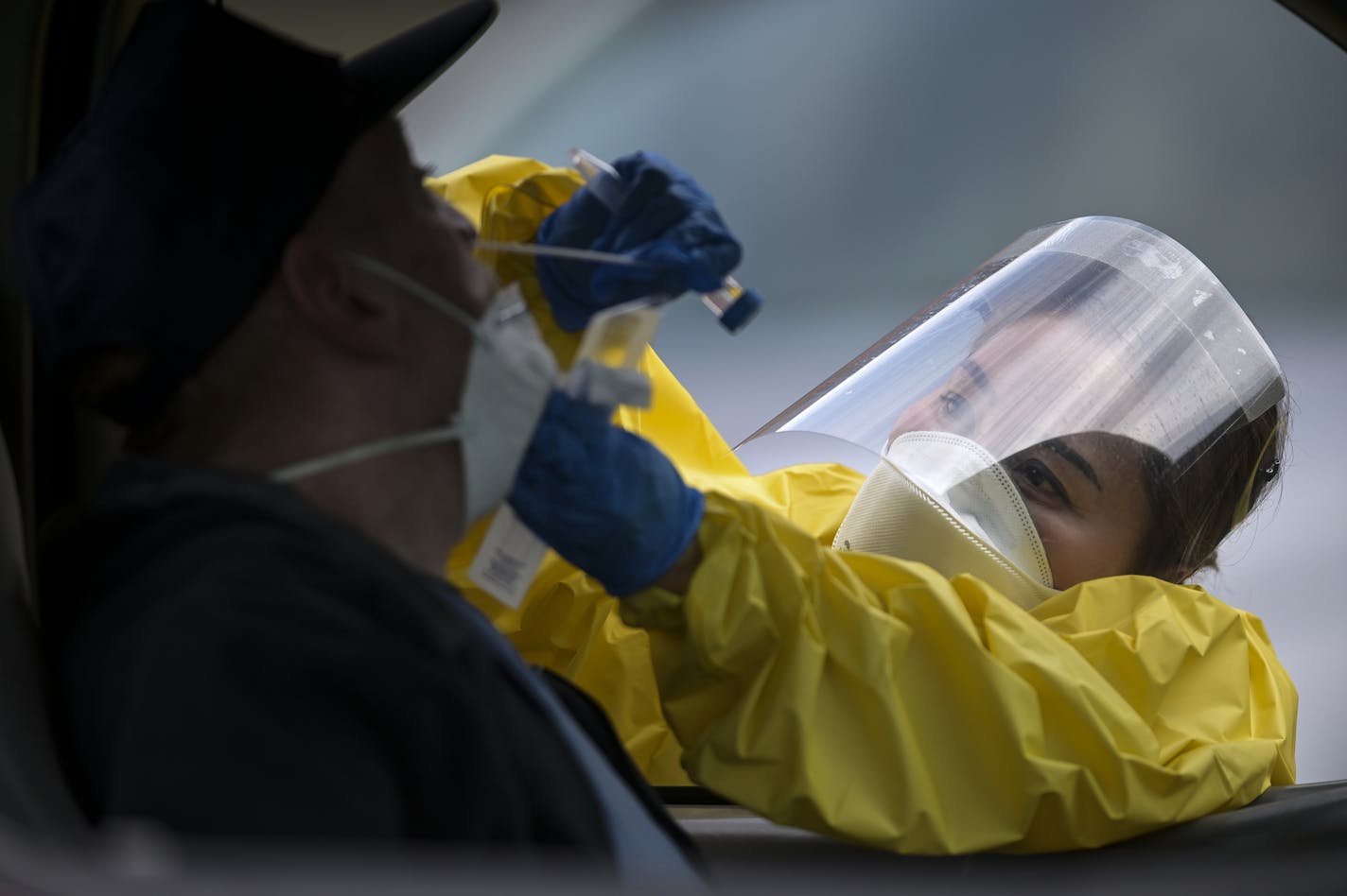 Elizabeth Santoro, a medic with the Minnesota Air National Guard 133rd Medical Group, administered a free COVID-19 test to Thomas Harmon, 61, of Robbinsdale. ] aaron.lavinsky@startribune.com The Minnesota National Guard offered free COVID-19 testing at the Minneapolis Armory on Saturday, May 23, 2020 in Minneapolis, Minn. There were six free testing locations across the state, which were operated by the National Guard, the Minnesota Dept. of Health and the State Emergency Operations Center.