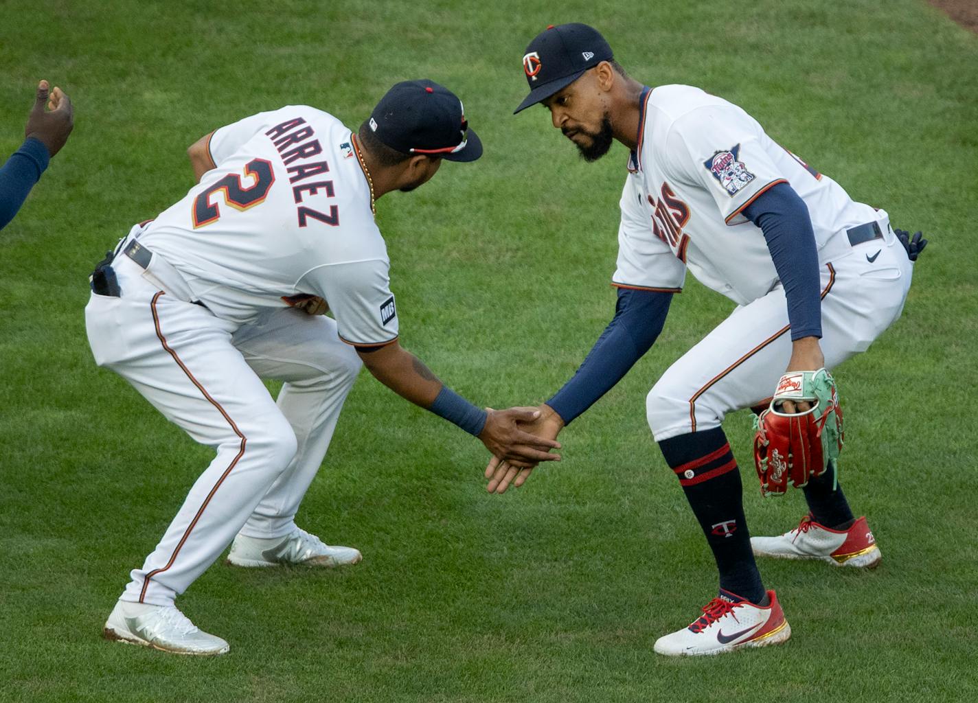 Luis Arraez (2) and Byron Buxton (25) of the Minnesota celebrated at the end of the game.