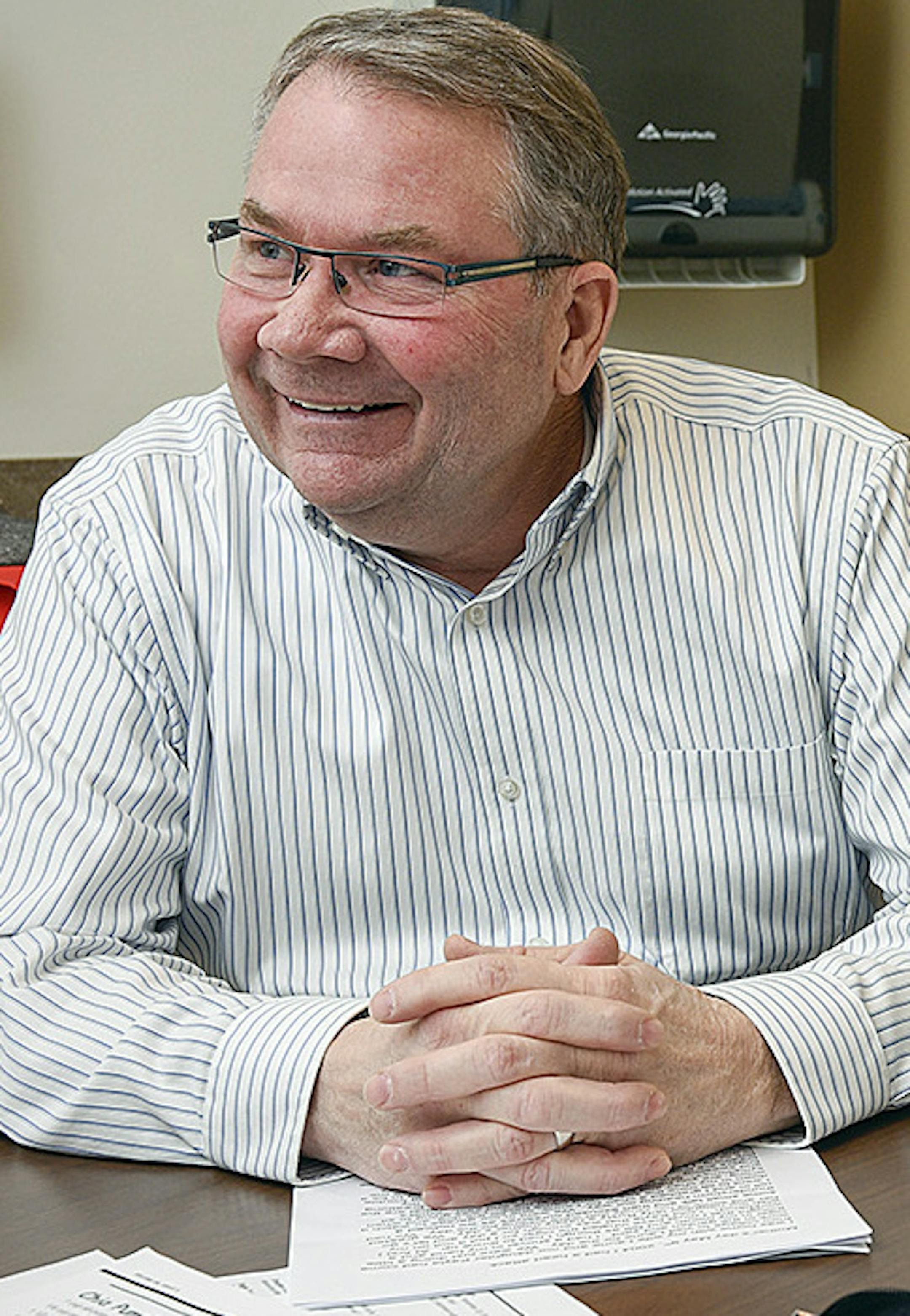 In this Monday, Dec. 19, 2016 photo Joel Vogel and Pete Olson talk about the Mended Hearts volunteer program at the St. Cloud Hospital, in St. Cloud Minn. (Jason Wachter/St. Cloud Times via AP) ORG XMIT: MNCLO101