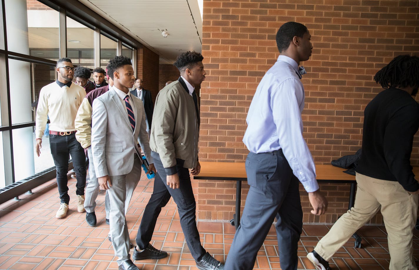 Ten Gophers football players walk into their closed-door appeal hearing in January for their alleged involvement in a sexual assault. On Monday, Antoine Winfield Jr., Kobe McCrary and Mark Williams were cleared; cornerback KiAnte Hardin is still facing expulsion.