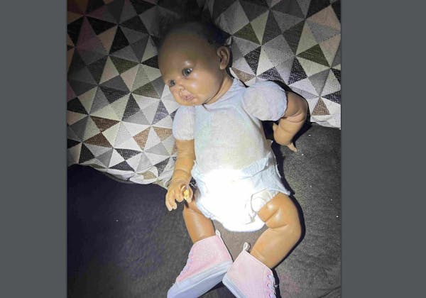 This is the doll that police saw when they peeked into a Brooklyn Center home shortly before breaking in, according to an attorney for the homeowner.