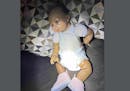 This is the doll that police saw when they peeked into a Brooklyn Center home shortly before breaking in, according to an attorney for the homeowner.