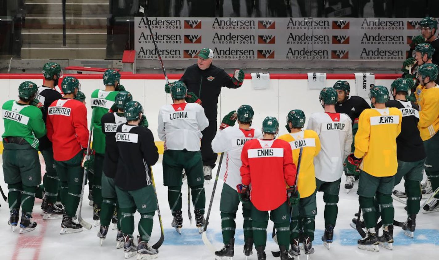 Wild head coach Bruce Boudreau addressed his team during a practice earlier this season.