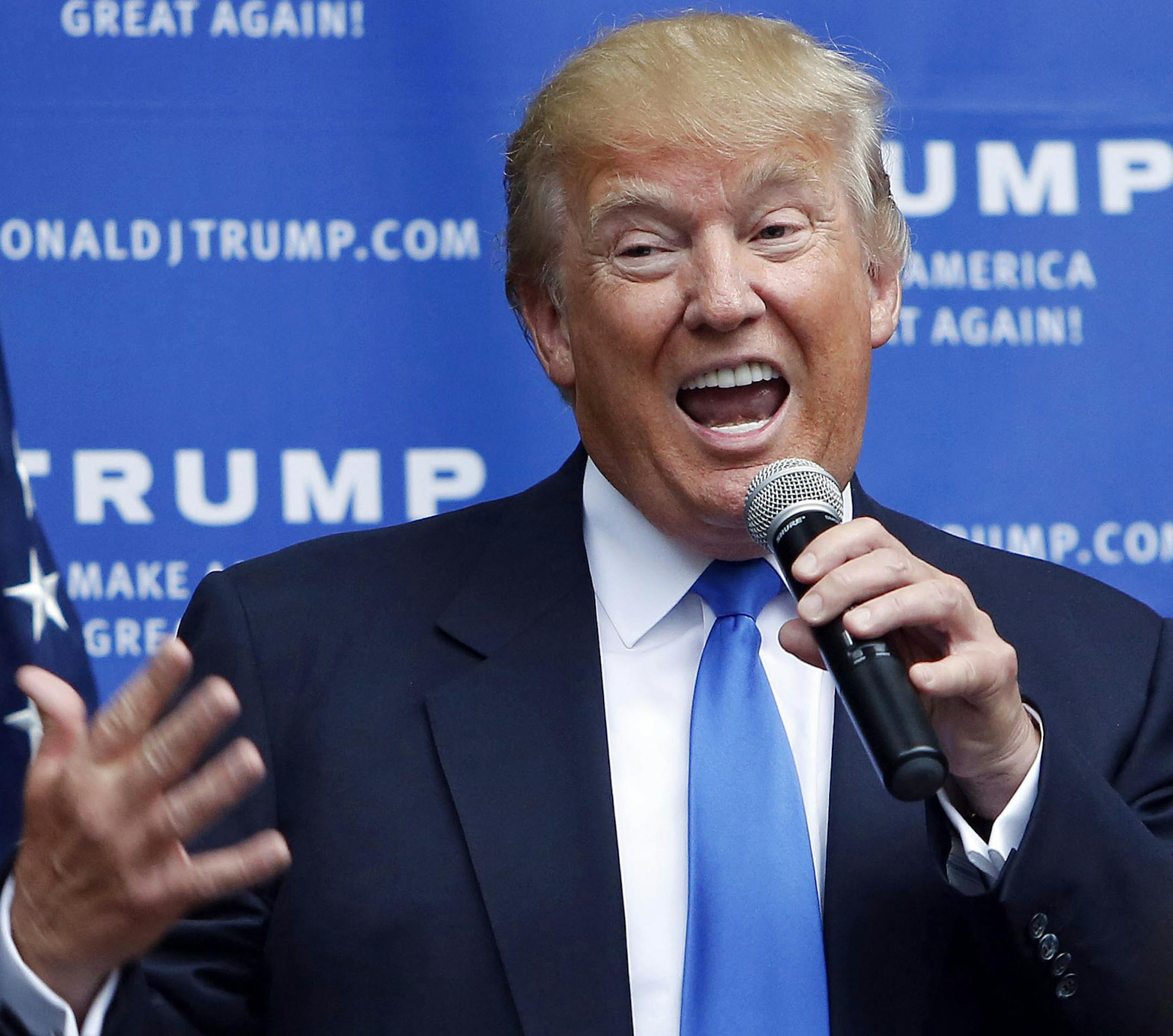 FILE - In this Tuesday, June 30, 2015, file photo, Republican presidential candidate Donald Trump speaks at a house party in Bedford, N.H. New York City officials are reviewing the city’s contracts with Trump after statements the GOP presidential hopeful made about Mexican immigrants. (AP Photo/Jim Cole, File)