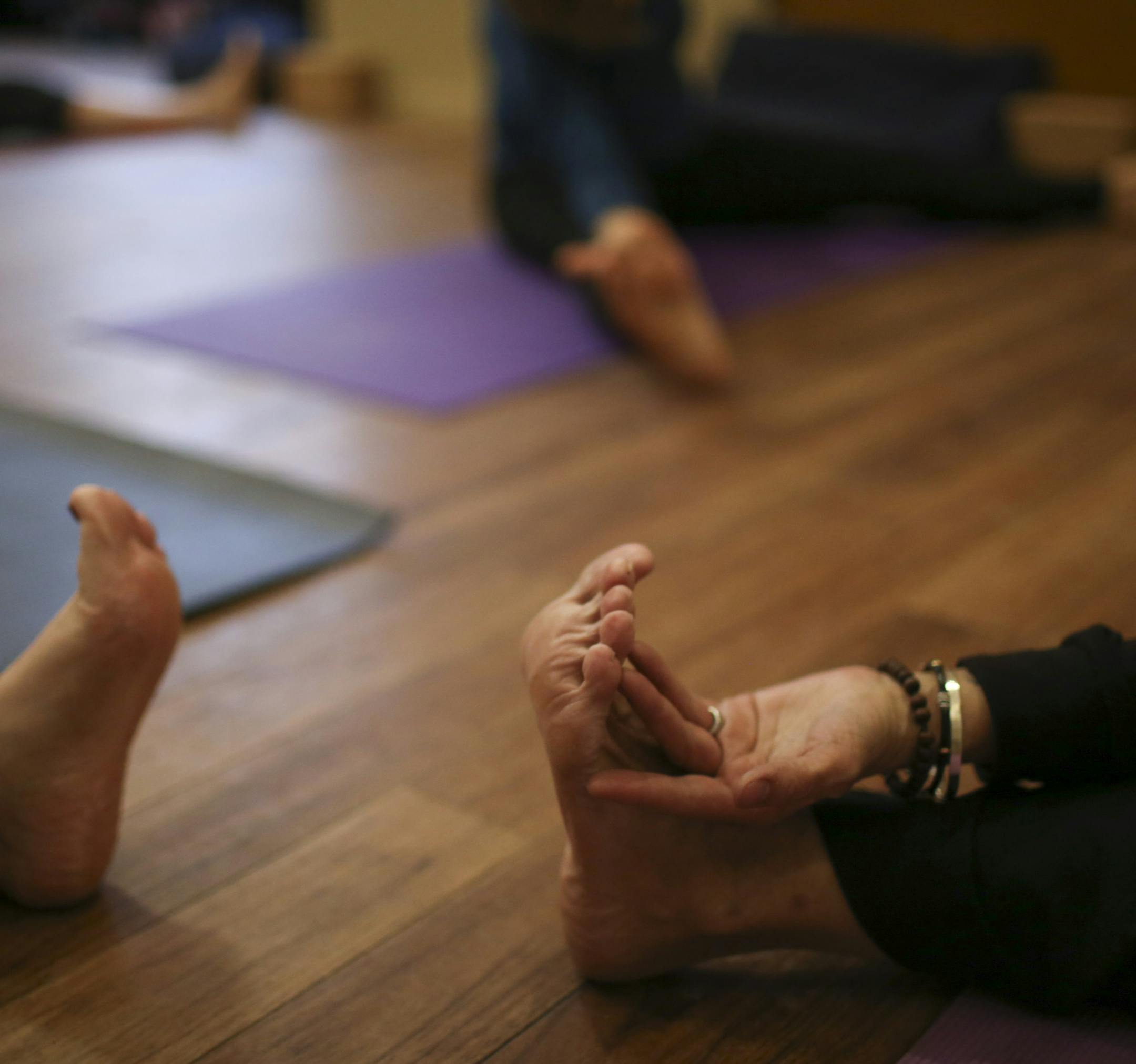Camille Gage, right, as she led her gentle Hatha yoga class Tuesday afternoon. ] JEFF WHEELER ‚Ä¢ jeff.wheeler@startribune.com The practice of yoga has nearly doubled in a decade as people seek ways to reduce stress, alleviate chronic pain and improve their outlook on life, according to a new nationwide survey by federal health agencies. Camille Gage led a gentle Hatha yoga class at the Penny George Institute for Health and Healing in Minneapolis Tuesday afternoon, February 10,