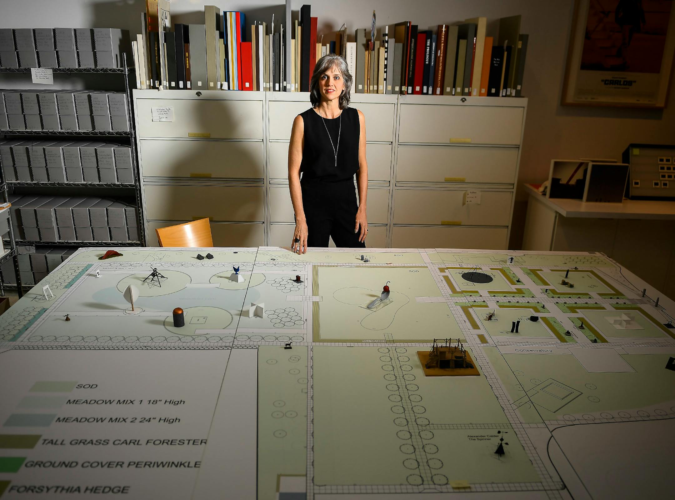 Walker Art Center director Olga Viso was photographed in the archives of the Walker Art Center with a model of the Minneapolis Sculpture Garden that was used in its planning.
