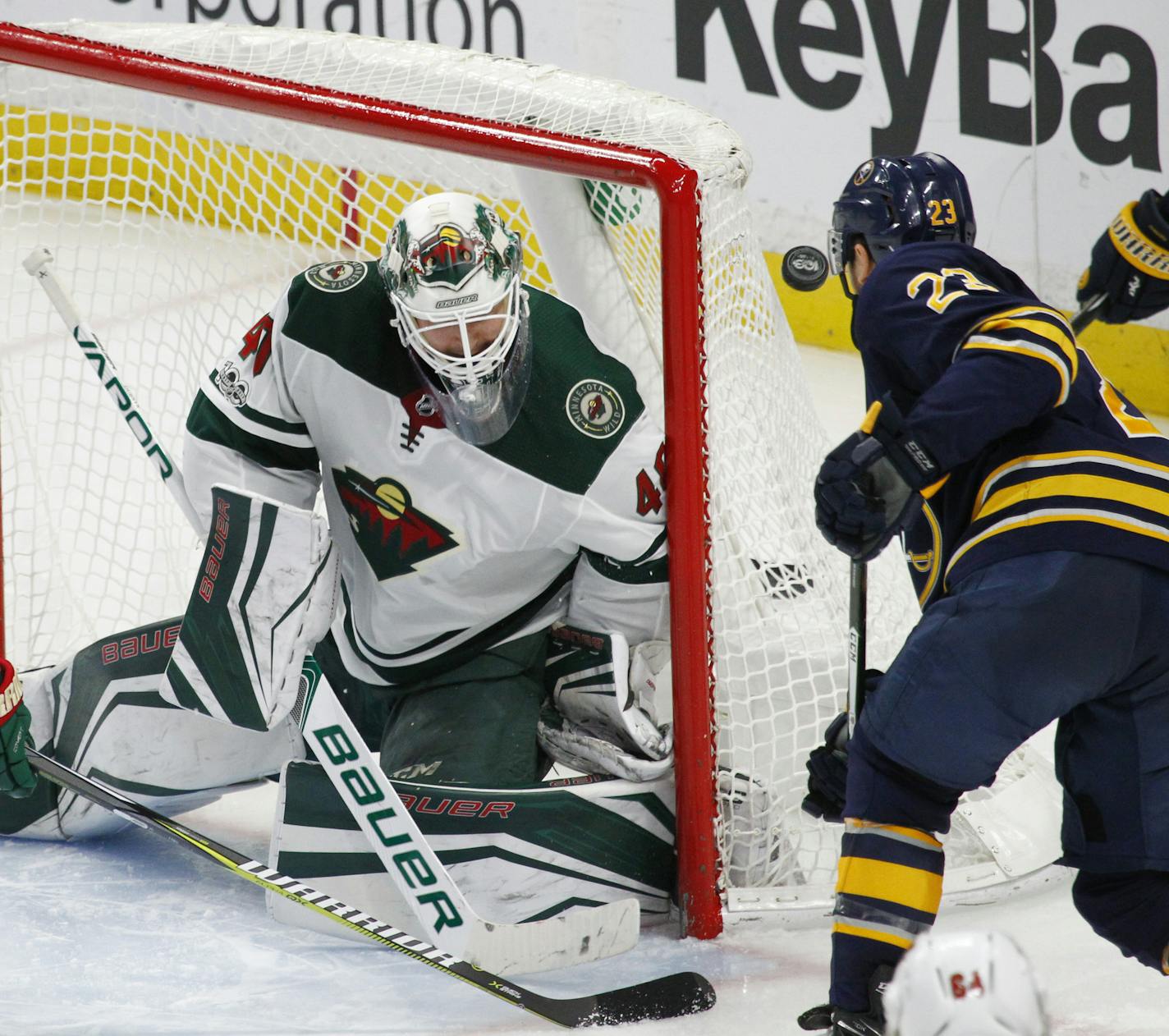 Buffalo Sabres forward Sam Reinhart (23) is stopped by Minnesota Wild goalie Devan Dubnyk (40) during the third period of an NHL hockey game, Wednesday Nov. 22, 2017, in Buffalo, N.Y. (AP Photo/Jeffrey T. Barnes)