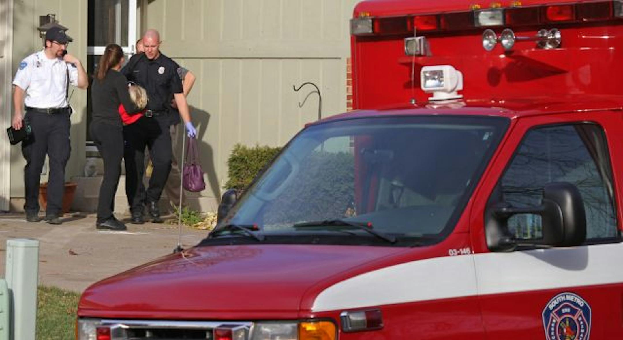 (center) South Metro Firefighter Sean Jansen and Pat Noack (not pictured) were first responders to a medical emergency were a two year old girl had a seizure at her home. HealthEast emt's also responed to the call and transported the girl who was carried to the ambulance by her mother. NOTE-WE CAN NOT SHOW FACES OF PATIENTS ON THE EMERGENCY RUNS.