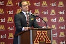 Newly named University of Minnesota football coach P.J. Fleck paused as he spoke during a press conference Friday.