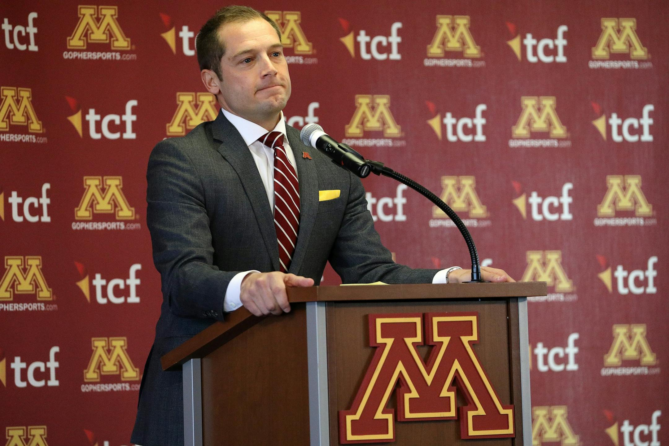Newly named University of Minnesota football coach P.J. Fleck paused as he spoke during a press conference Friday.