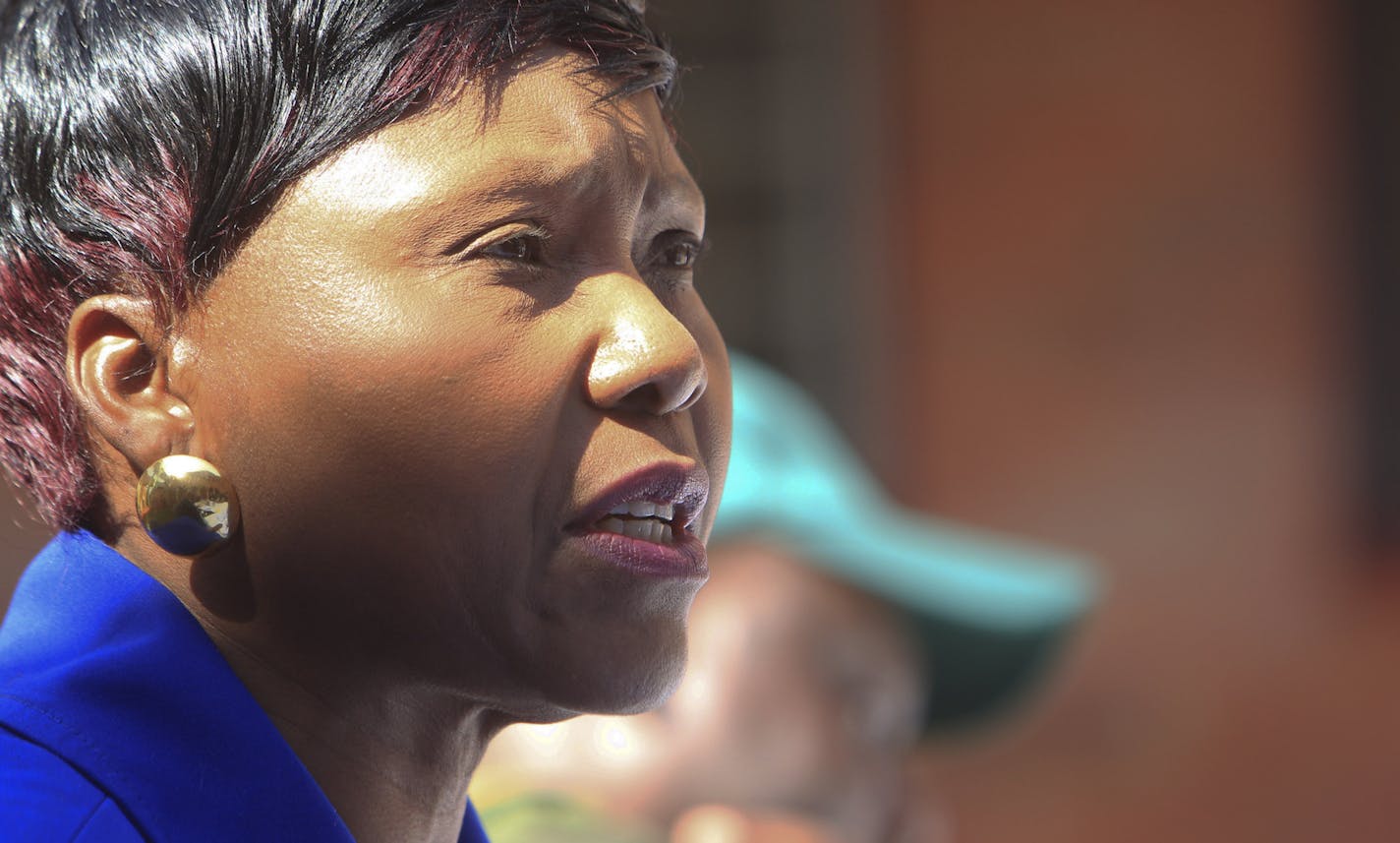 Oppah Muchinguri, theZimbabwean Minister of Environment, Water and Climate addresses a press conference in Harare, Zimbabwe, Friday, July, 31, 2015. Zimbabwe intends to seek the extradition of an American dentist who killed a lion that was lured out of a national park and shot with a bow and a gun, and the process has already begun, a Cabinet minister said Friday. "Unfortunately it was too late to apprehend the foreign poacher as he had already absconded to his country of origin," Oppah Muchingu