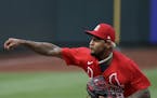 St. Louis Cardinals pitcher Carlos Martinez throws during the fifth inning of an exhibition baseball game against the Kansas City Royals Wednesday, Ju