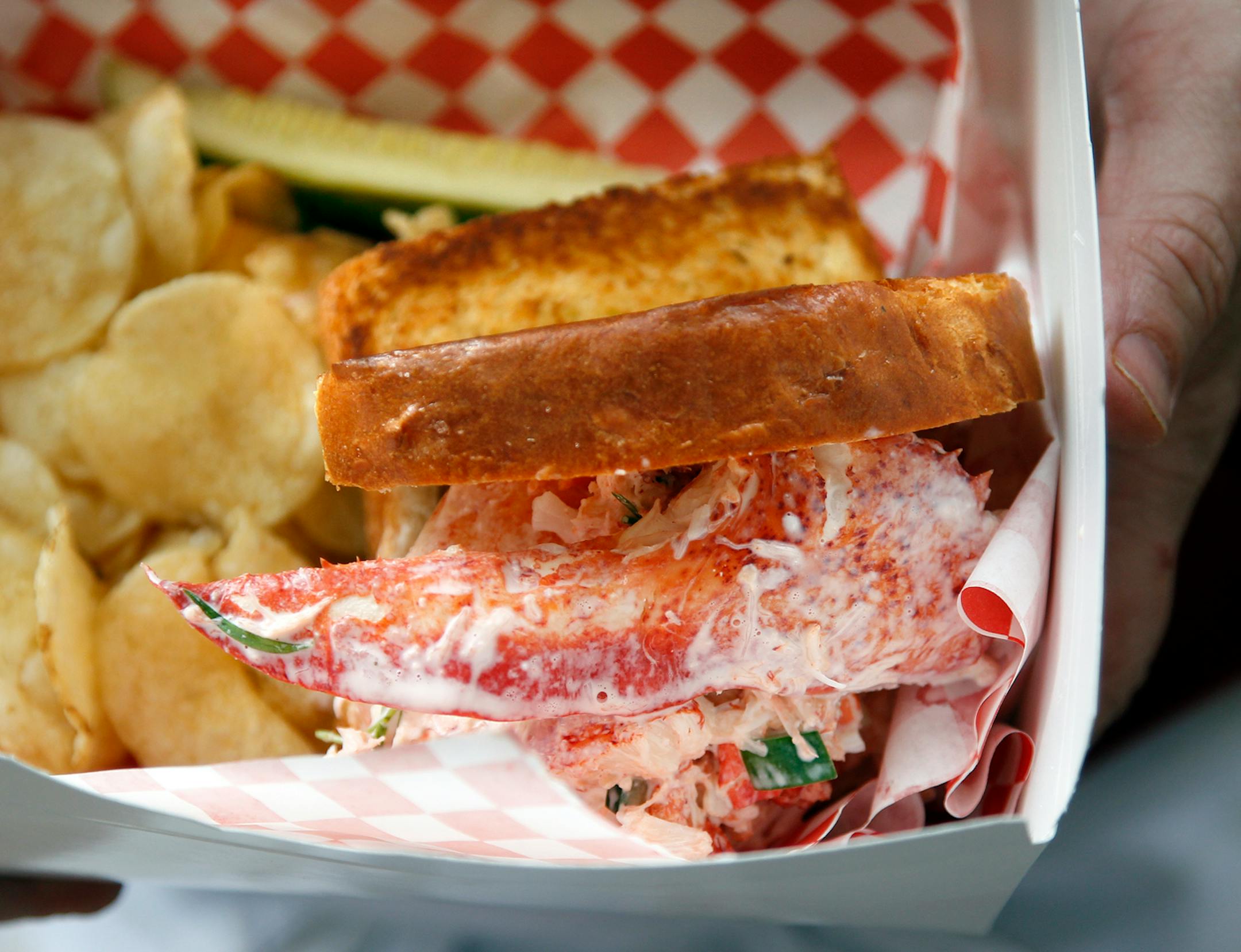 TOM WALLACE � twallace@startribune.com Assignments #20018084A_ May 14, 2011_ SLUG: taste5005xx_ List of 50 things you need to know about for the annual taste 50 Taste section. _ IN THIS PHOTO:] Find the Smack Shack food truck M-F from 11 a.m. to 1:30 p.m. on Marquette Av. between 6th and 7th St., in front of the Wells Fargo Center.