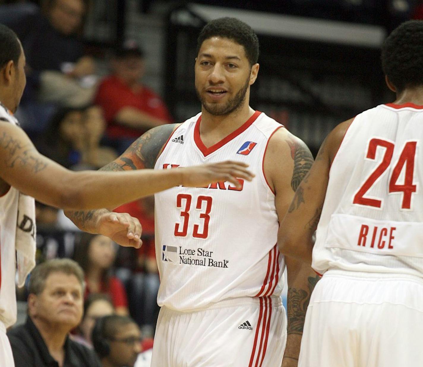 Rio Grande Valley Vipers' Royce White (33) high-fives his teammates during a timeout against the Maine Red Claws in a basketball game Tuesday, Feb. 12, 2013, in Hidalgo, Texas. White scored seven points, grabbed eight rebounds and had four assists for the Vipers in their 139-122 win over Maine, one day after reporting to the Houston Rockets' developmental league affiliate. He had been away from the Rockets since early November after requesting an arrangement to help him properly treat his diagno