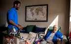 Windell Garmondeh, employee at Aurora, talked with Gerry Gilbert, a resident at Aurora on France senior living on Wednesday in Edina.