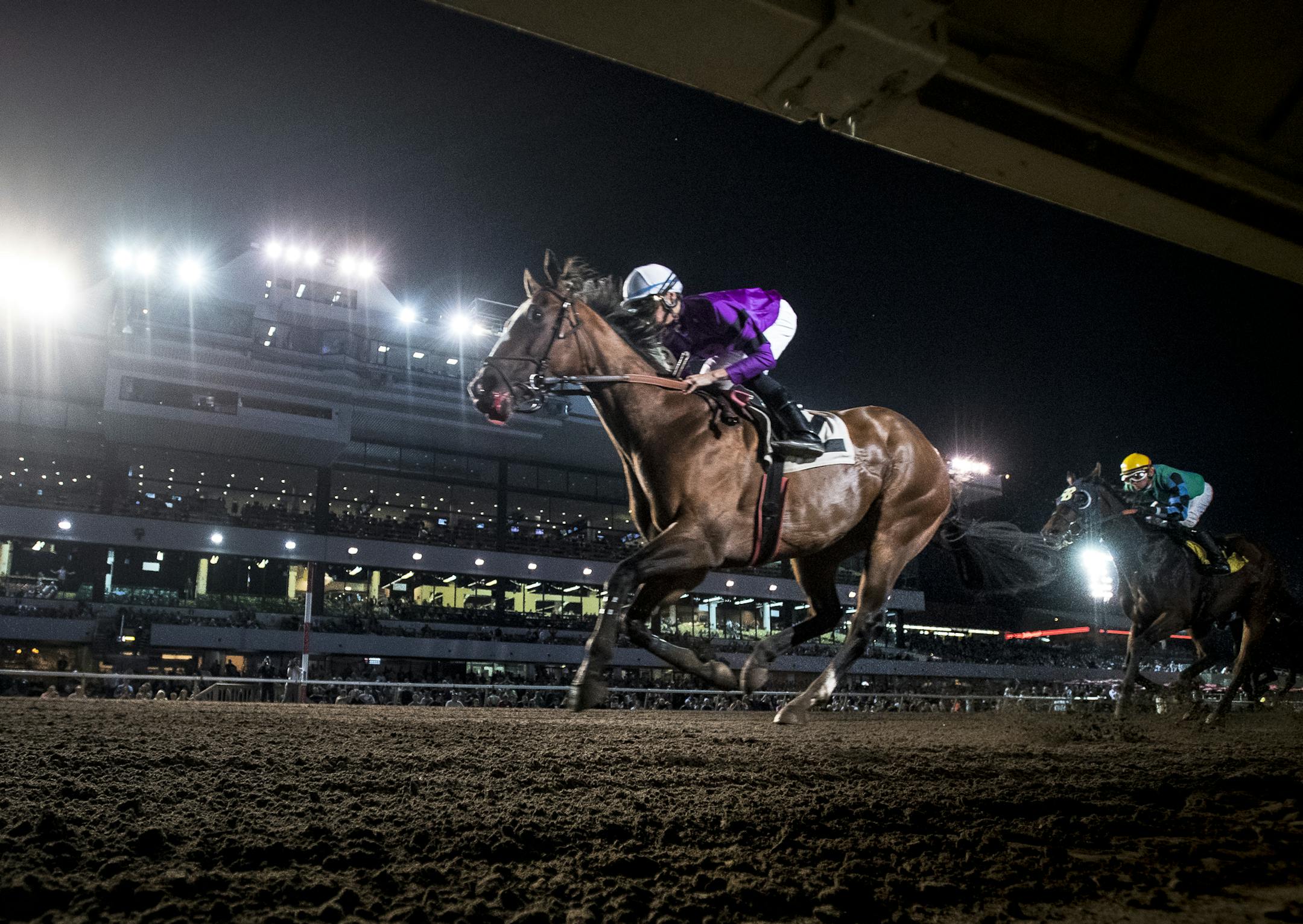 "Bourbon County," ridden by Alex Canchari, crossed the finish line to win first place in the Canterbury Park Stakes 10,000 Lakes Stakes Friday night. ] (AARON LAVINSKY/STAR TRIBUNE) aaron.lavinsky@startribune.com The racing season kicked of at Canterbury Park on Friday, May 20, 2016 in Shakopee, Minn.