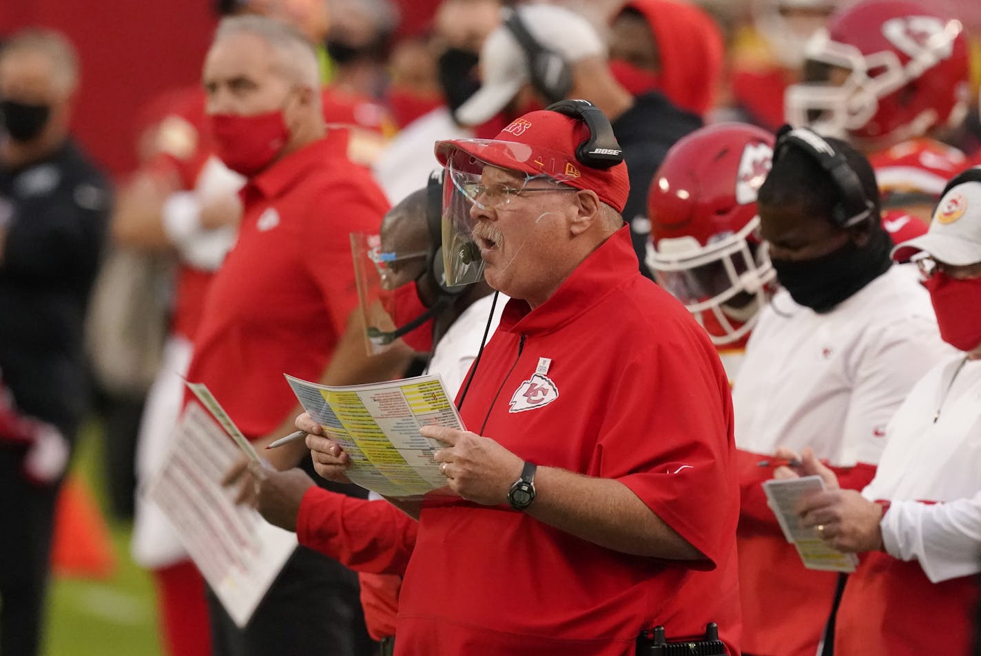 Kansas City Chiefs head coach Andy Reid watches from the bench during the first half of an NFL football game against the New England Patriots, Monday, Oct. 5, 2020, in Kansas City. (AP Photo/Charlie Riedel)