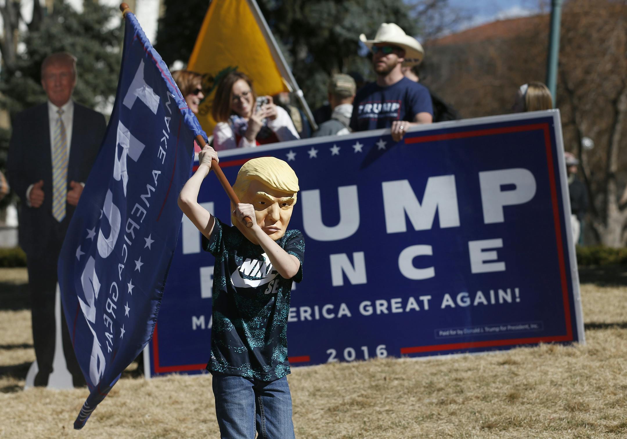 Supporters of President Donald Trump gather during a March 4 Trump rally at the state capitol in Denver, Saturday, March 4, 2017. (AP Photo/Brennan Linsley)