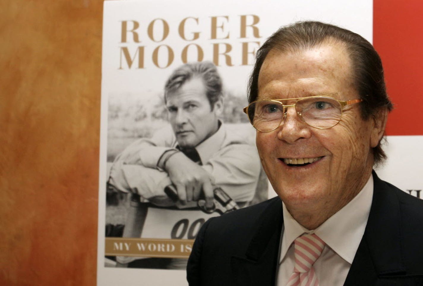 British actor Roger Moore attends a news conference to promote his latest book "The World is My Bond" in Hong Kong in 2008.