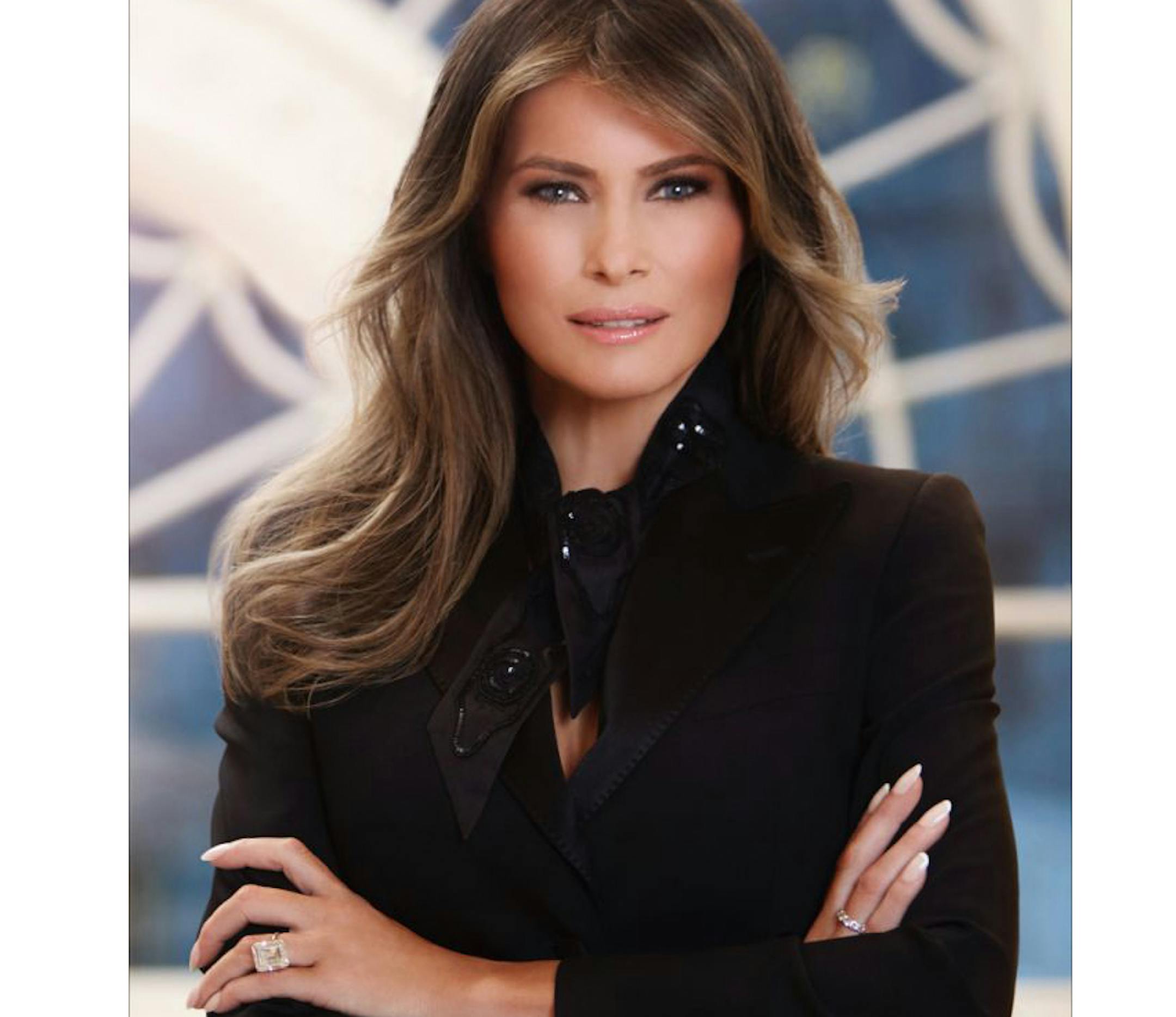 In this photo provided by the White House, first lady Melania Trump in her first official portrait as the first lady as photographed in her new residence at the White House in Washington.