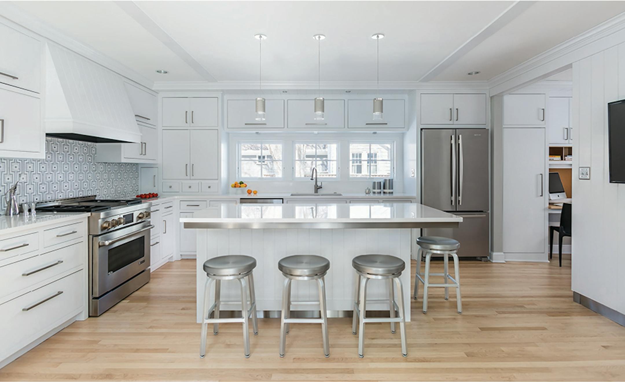 Main floor renovation transformed the home within the original footprint, by Rehkamp Larson Architects.
