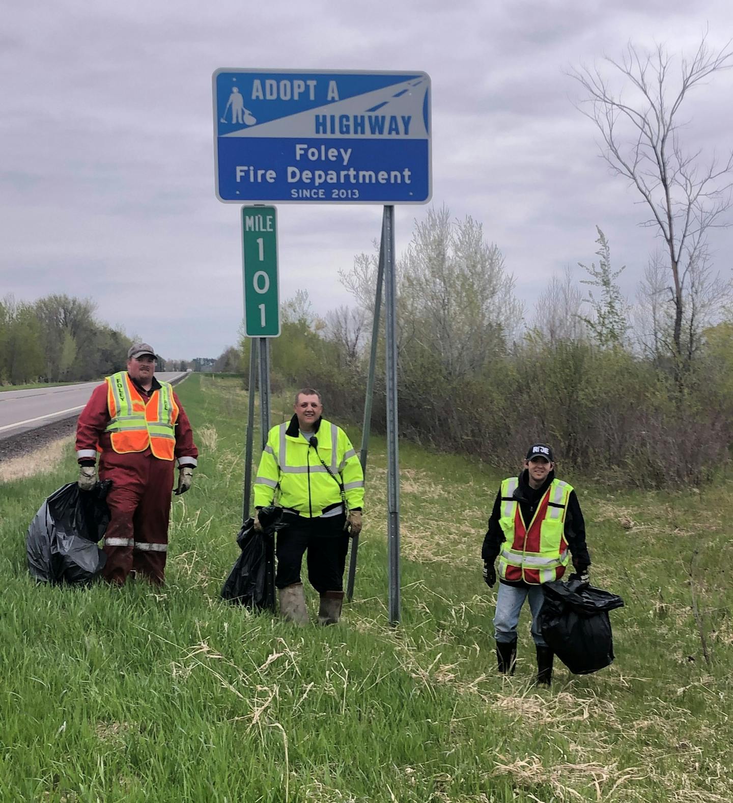 Members of the Foley Fire Department picked up trash along a highway near Foley.