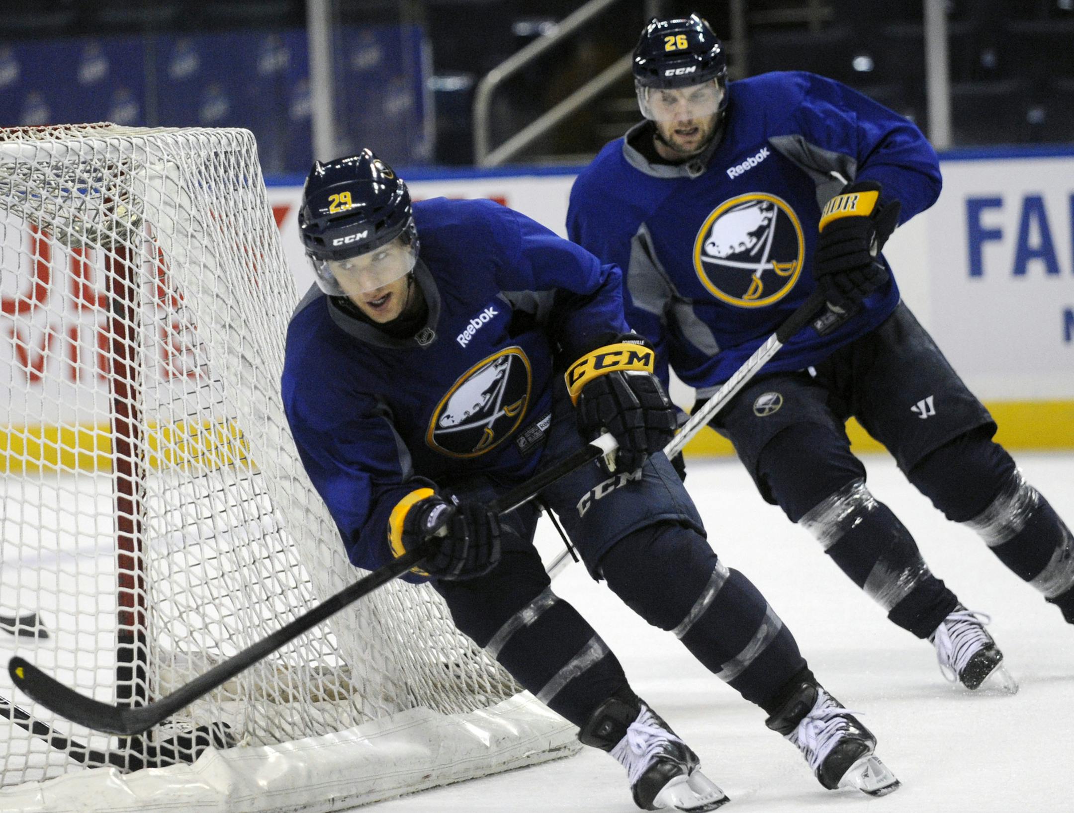 Jason Pominville, left, and former Gopher Thomas Vanek skated together for eight seasons with the Buffalo Sabres. That bond is viewed as a possible incentive for Vanek to join the Wild in free agency.