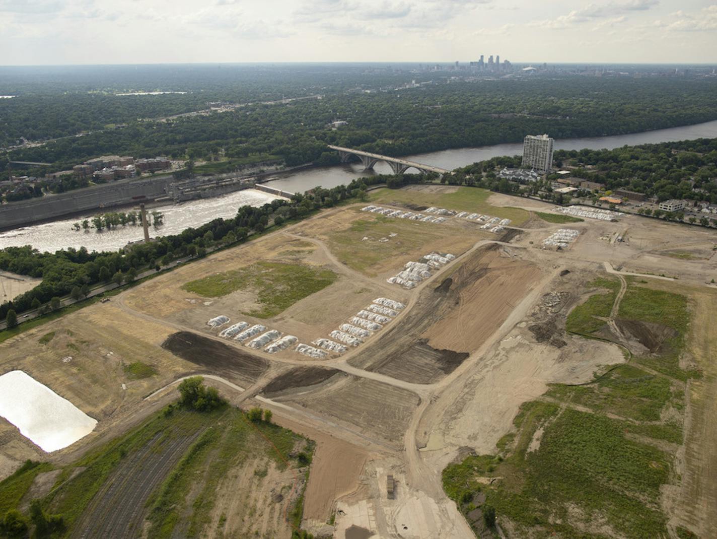 The former Ford assembly plant site, looking northwest, with the downtown Minneapolis in the background. ] JEFF WHEELER &#x2022; jeff.wheeler@startribune.com Minneapolis based Ryan Cos. US Inc. announced Monday that it will buy the site of the former Ford assembly plant, transforming the 122-acre parcel in the Highland Park neighborhood into a high-density urban village.The site near the Mississippi River was photographed from the air Monday evening, June 25, 2018.