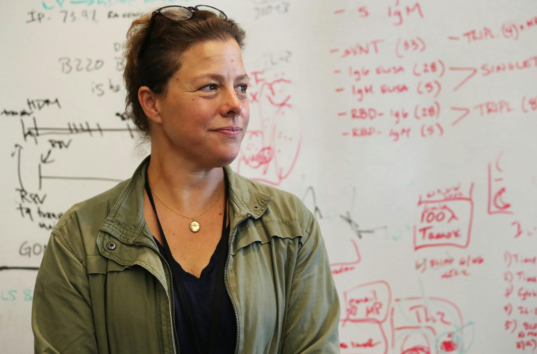With her mask off for a portrait, University of Washington immunologist Marion Pepper is leading research on monoclonal antibodies as a fast and effective treatment for COVID-19. (Ken Lambert/The Seattle Times/TNS)