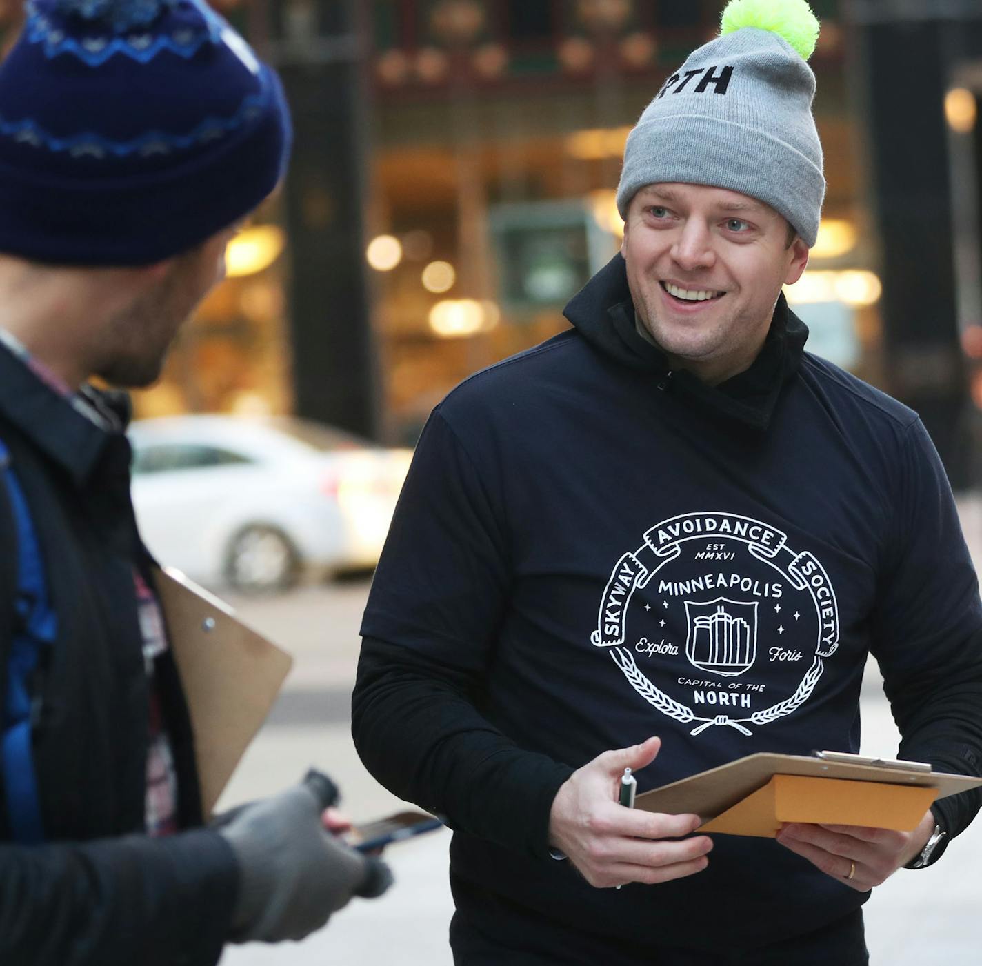 Entrepreneur Eric Dayton and skyway critic, along with three fellow skyway critics, launched their "Skyway Avoidance Society" to encourage people to walk on the sidewalk Wednesday, Nov. 16, 2016, along Nicollet Avenue near 8th St. S. in Minneapolis, MN. Here, Dayton spoke with fellow "Skyway Avoidance Society" member Kurt Stafki, before they hit the nearby street corners, looking for converts to street walking over skyway walking.] (DAVID JOLES/STARTRIBUNE)djoles@startribune.com One of the most