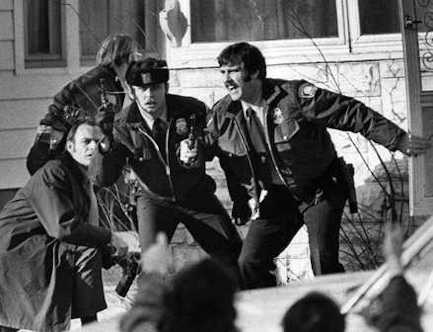 In 1973, Minneapolis police rushed a house to arrest several youths suspected of shooting a store clerk. (Star Tribune file photo)