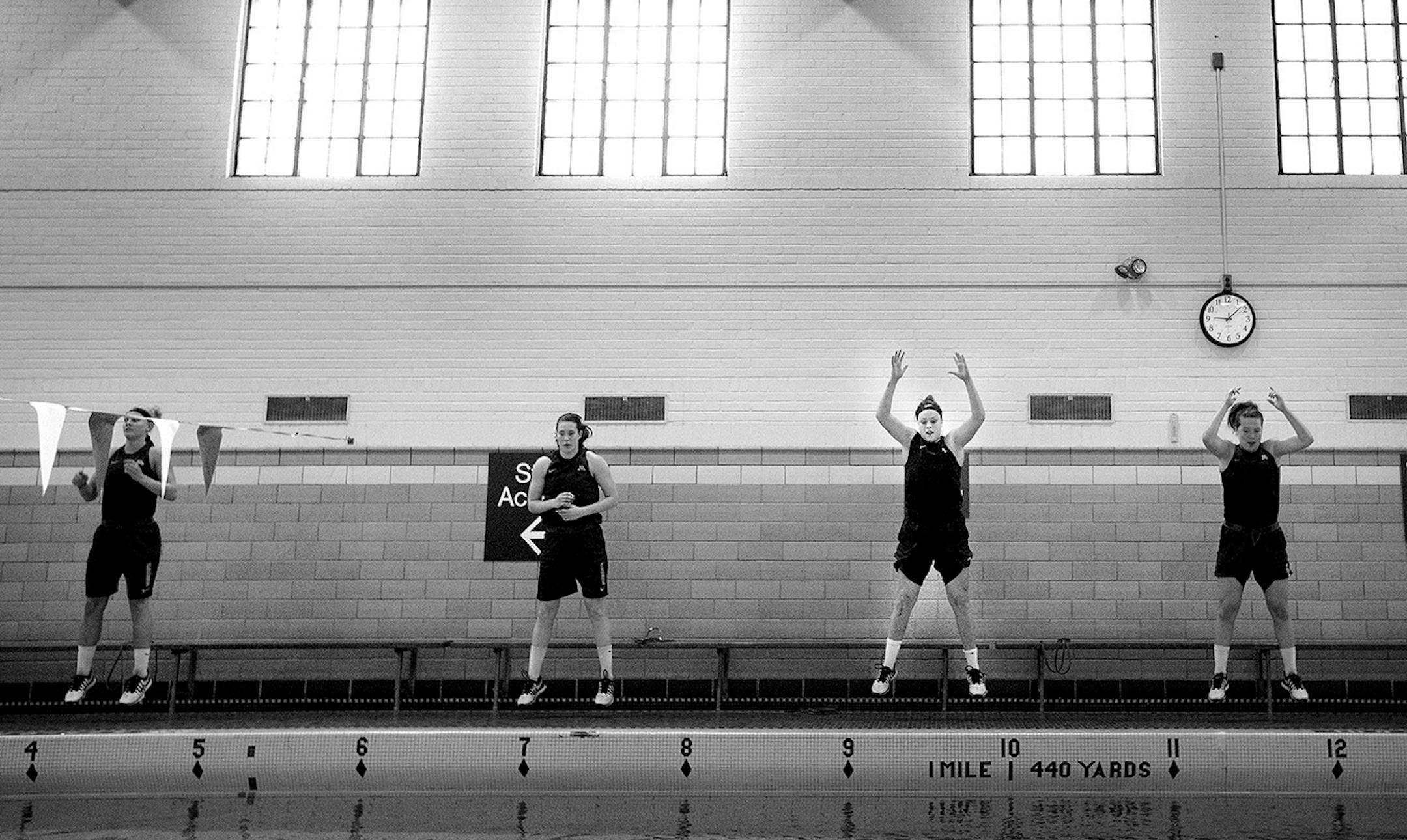 Rachel Banham with teammates during a pool workout session on July 10, 2015 at University Aquatic Center.